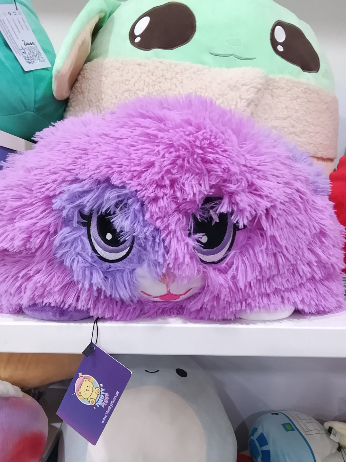 Cinnabun the Bunny purple plush toy.
