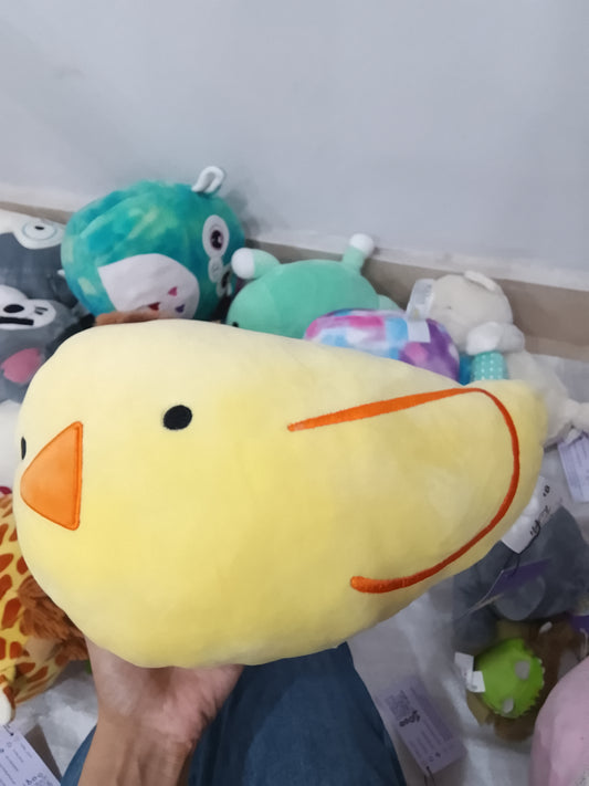 yellow Squishmallow Estelle the Chick plush toy.
