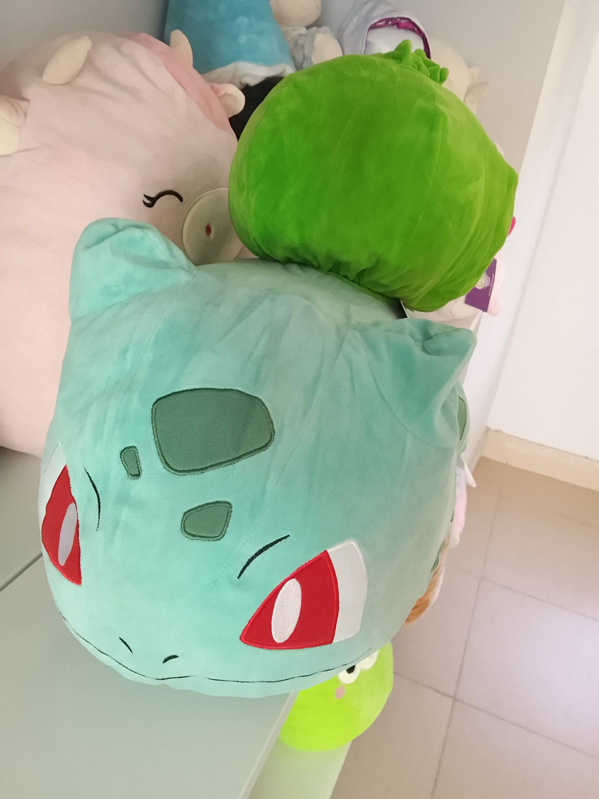 Pokémon Bulbasaur jumbo plush toy, Jazwares or the Pokémon Center.