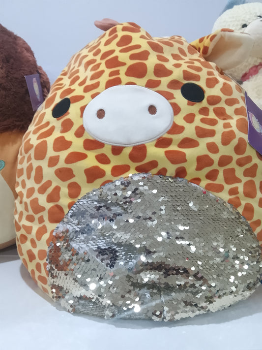 Squishmallows Gary the Giraffe plush toy featuring a unique silver sequin belly.