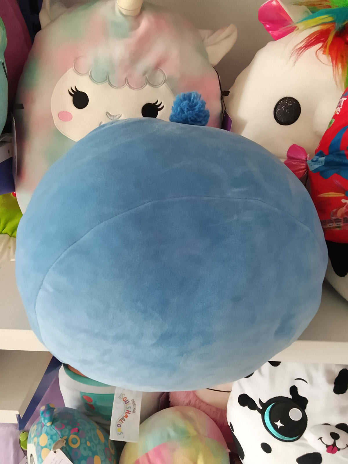 Squishmallows Stackables Babs the Blue Jay stuffed plush.