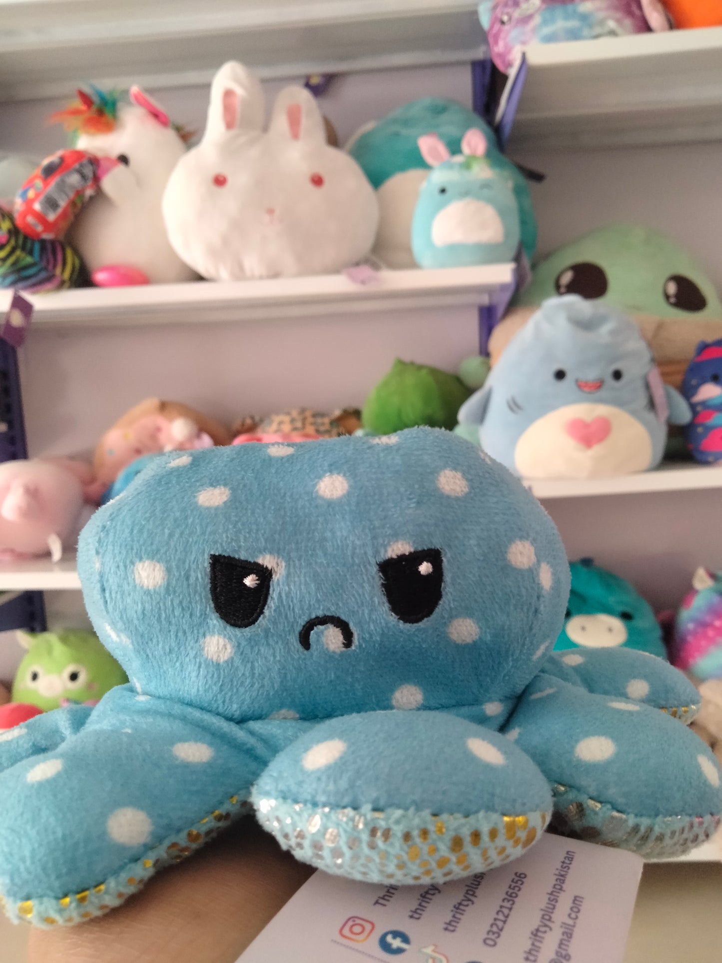 Reversible octopus plush toy,