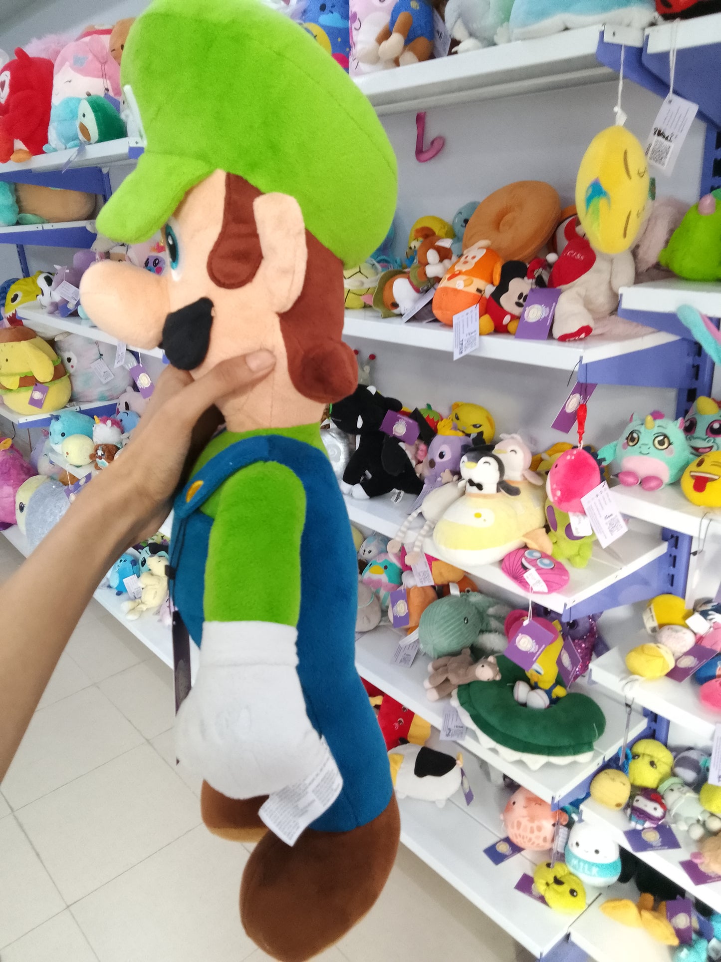Nintendo Super Mario Luigi plush toy.