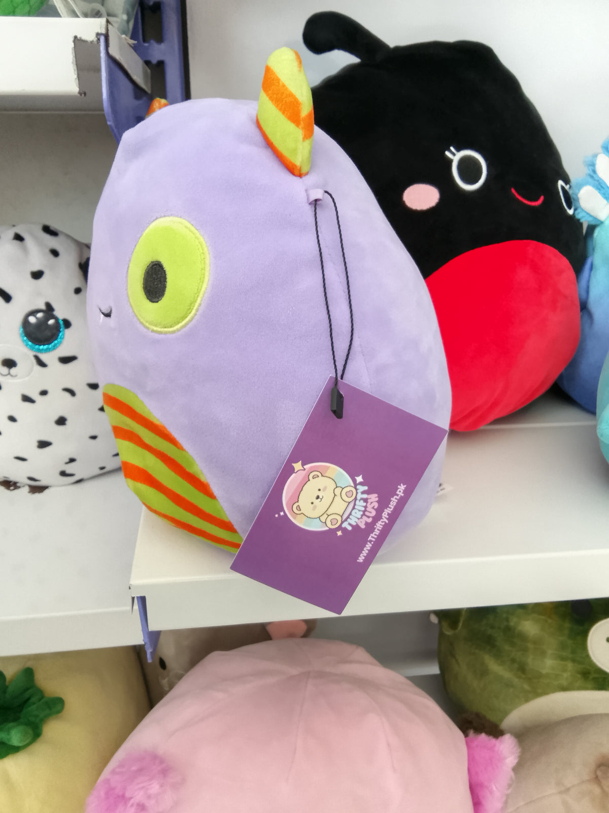 Squishmallows Marvin the Monster Halloween Treat Pail plush toy.