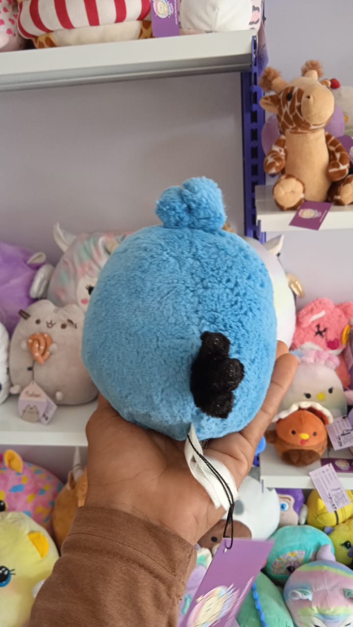 Blue Angry Birds franchise plush toy.