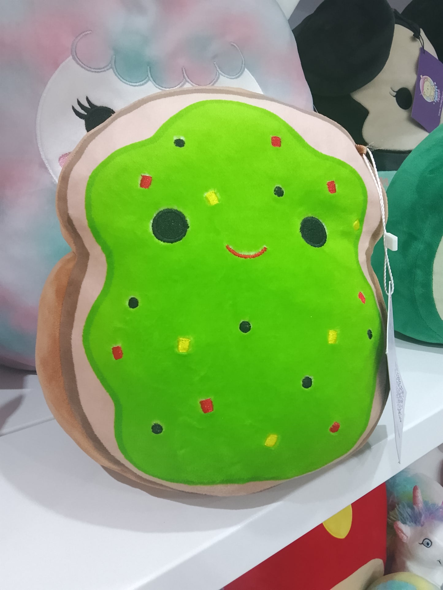 Squishmallows plush toy designed to look like Sinclair the Avocado Toast