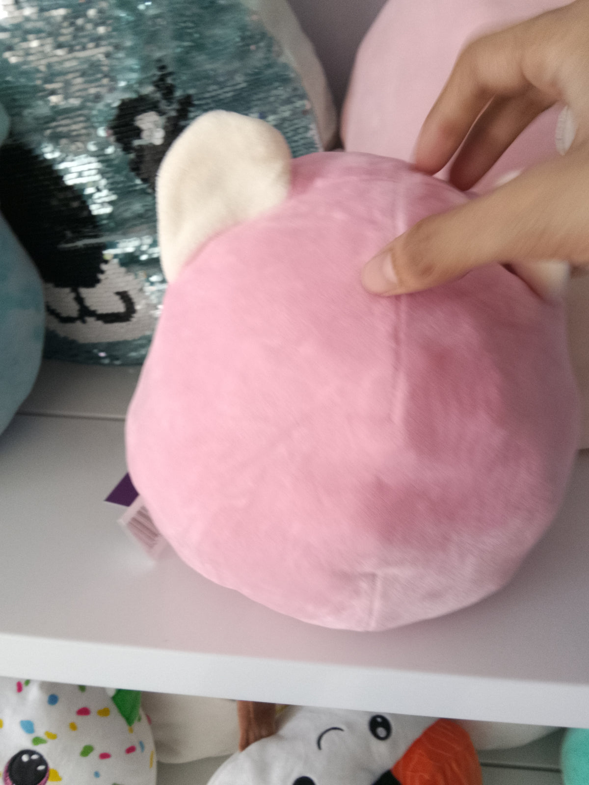 Squishmallows Flip-a-Mallow plush Dohna the Pink Panda and Mischa the Snow Leopard.