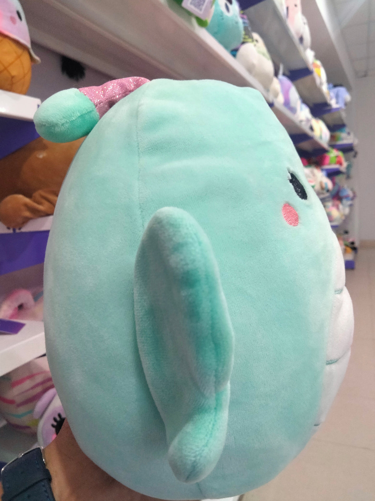 Squishmallows plush toy featuring Reina the Butterfly.