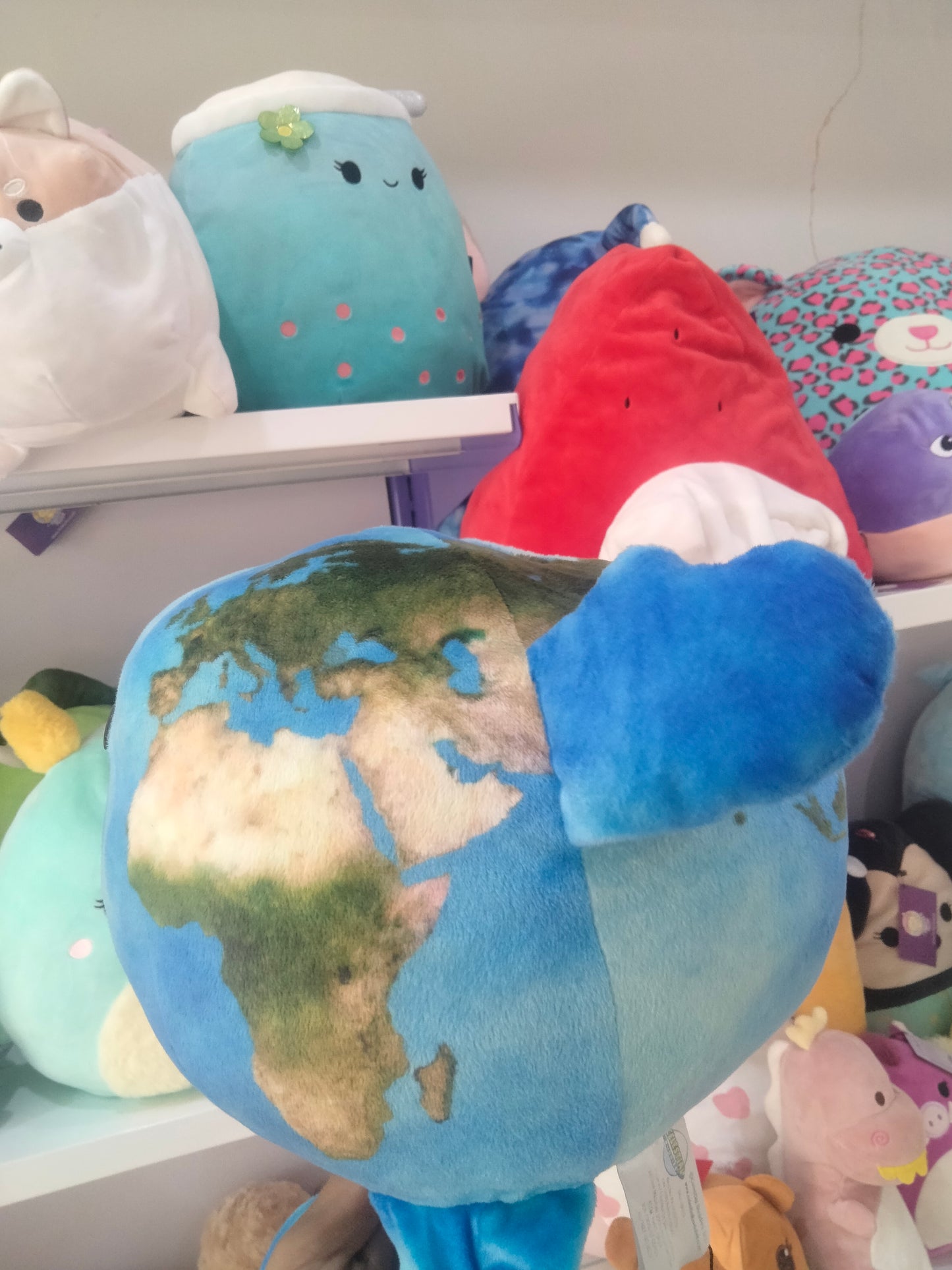 Our Precious Planet Buddy" plush toy by Celestial Buddies.