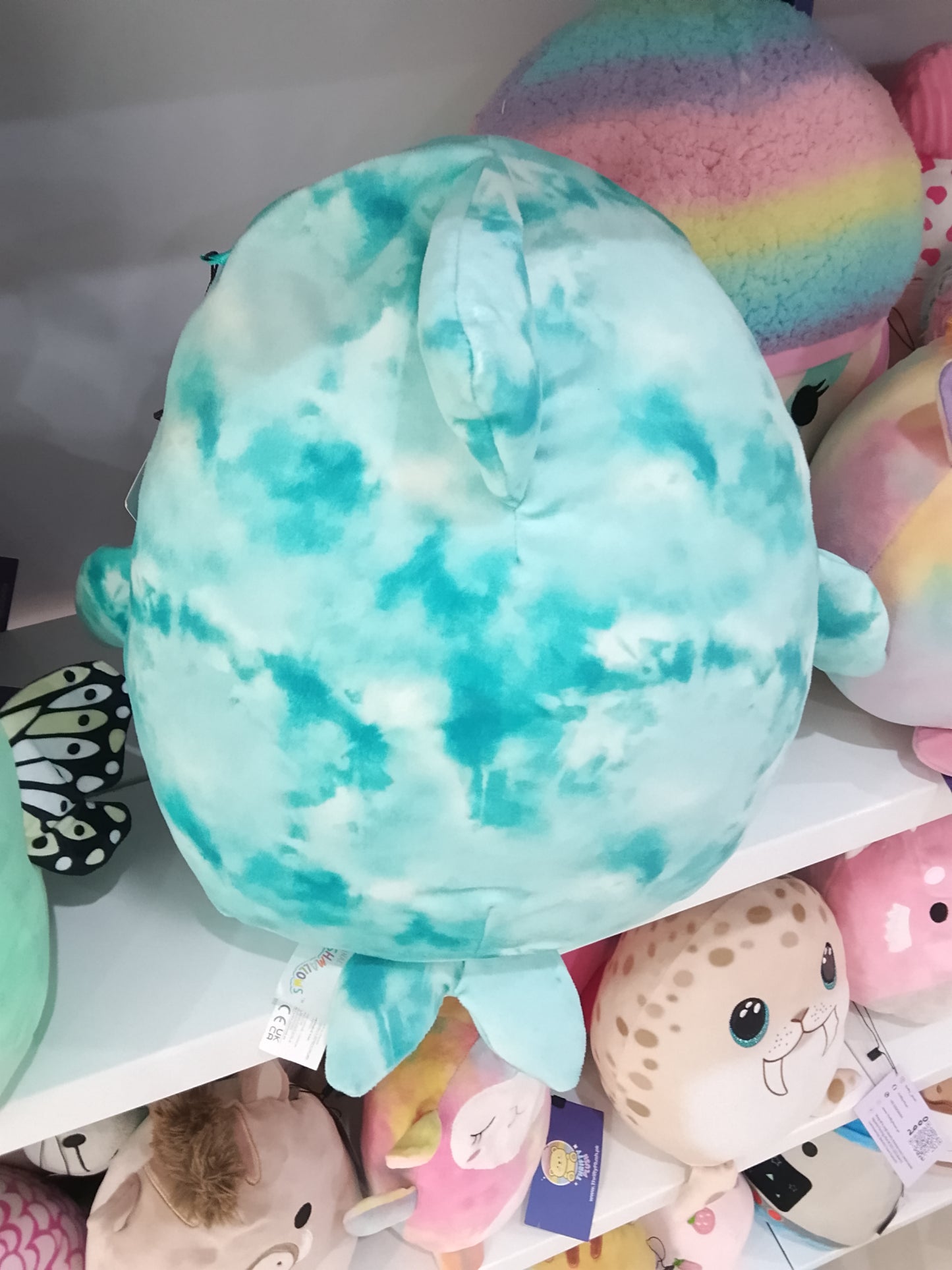 Squishmallows Danika the Blue Tie-Dye Dolphin plush toy.