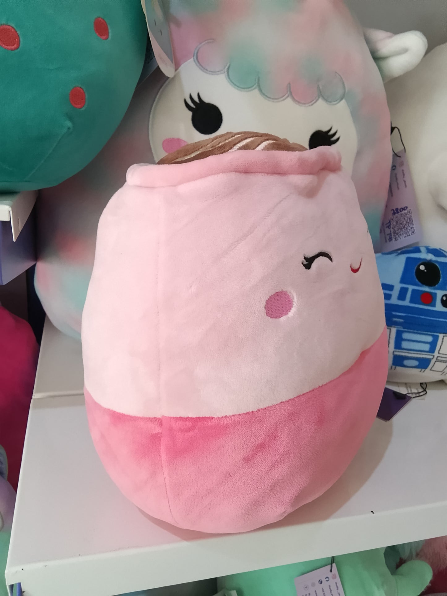 Squishmallow plush toy named Emery the Latte.