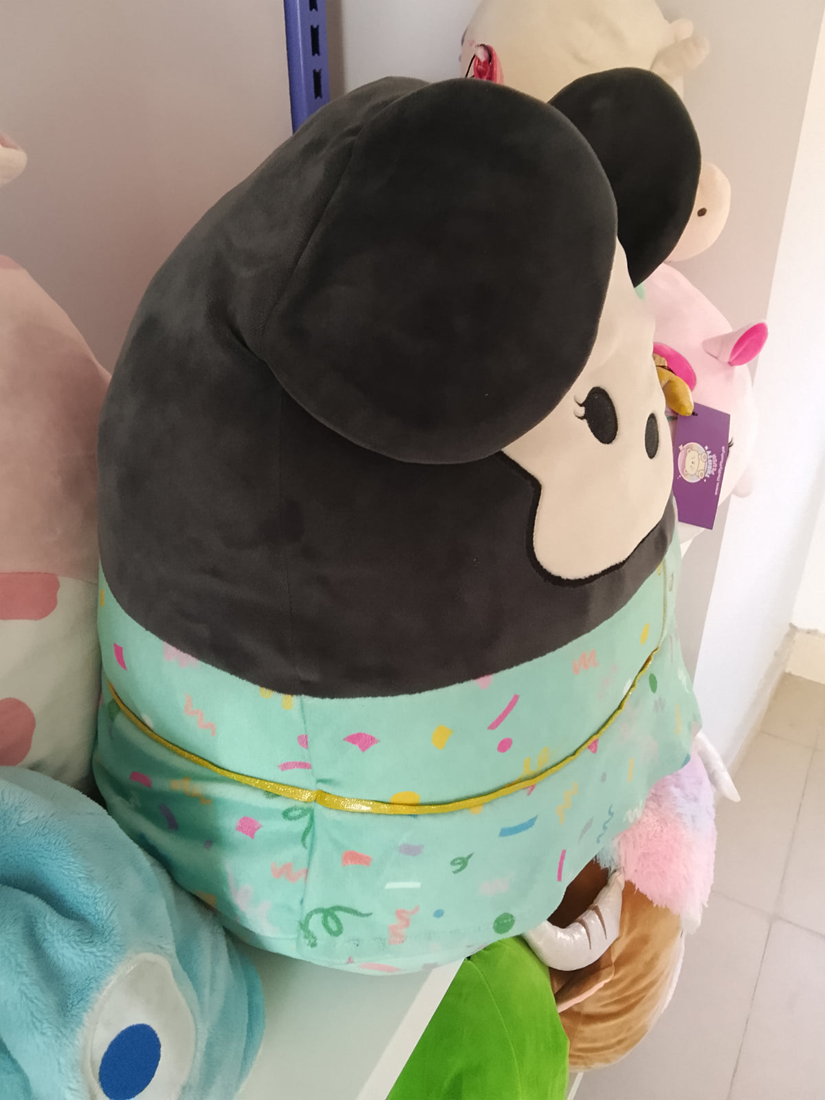 Squishmallows Disney Minnie Mouse plush toy.