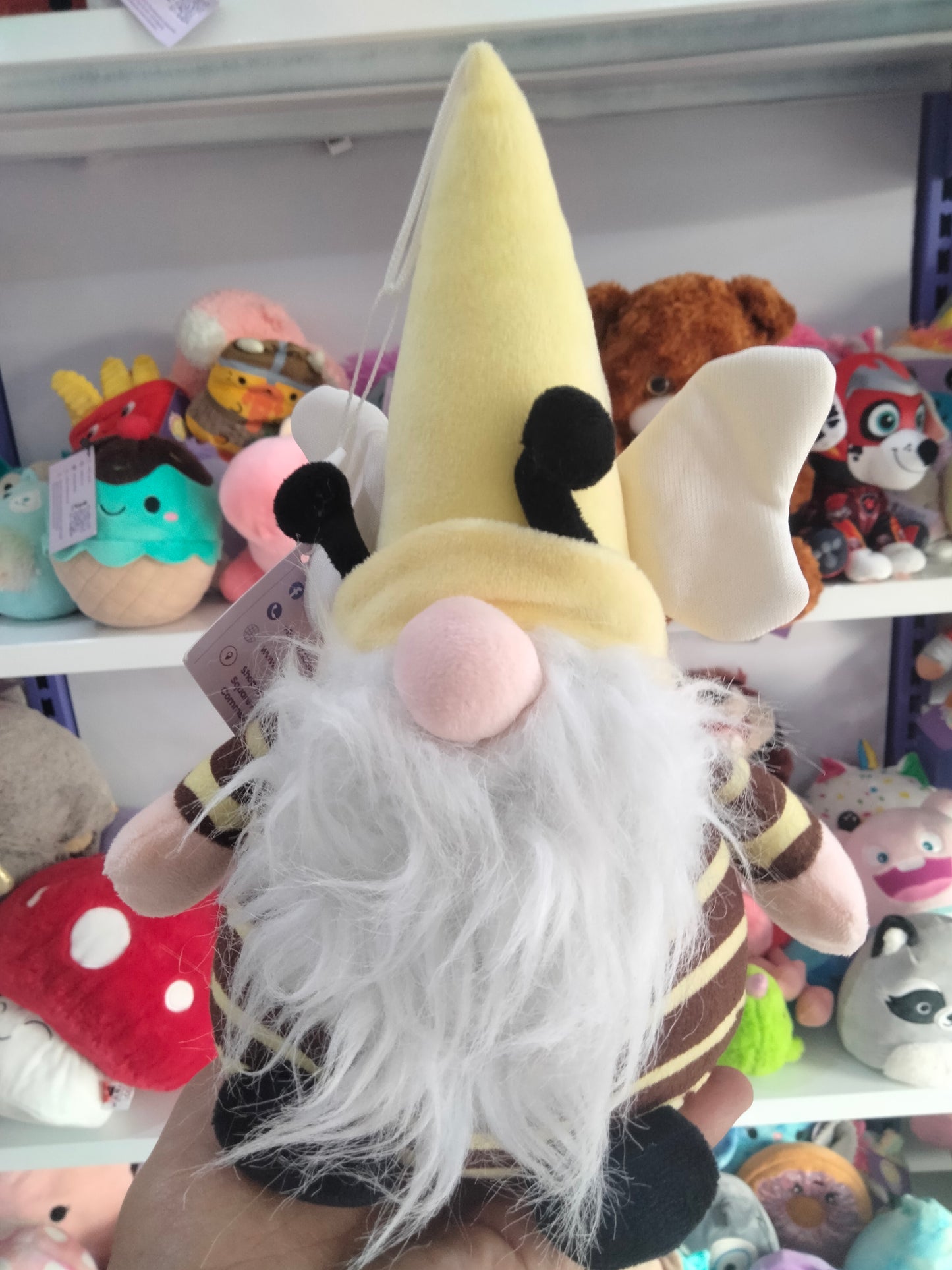 plush bumble bee gnome toy.