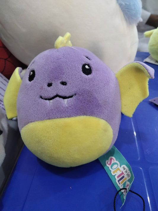 purple and yellow dragon plush toy