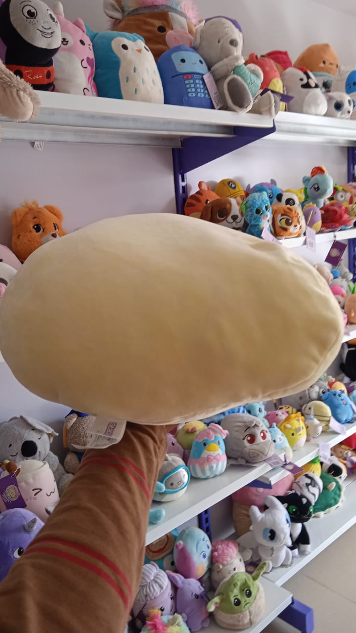 Aimee the Yellow Chick plush from the Squishmallows brand.