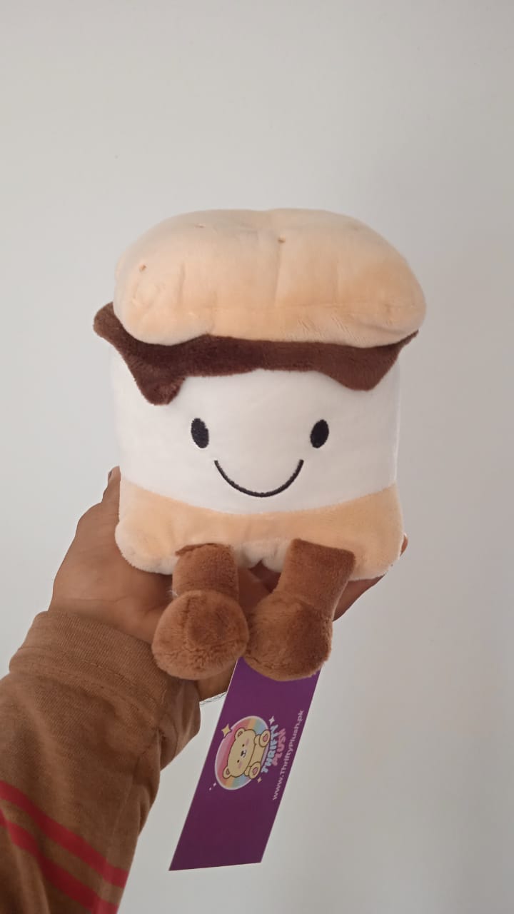 Palm Pals brand Aurora plush toy.