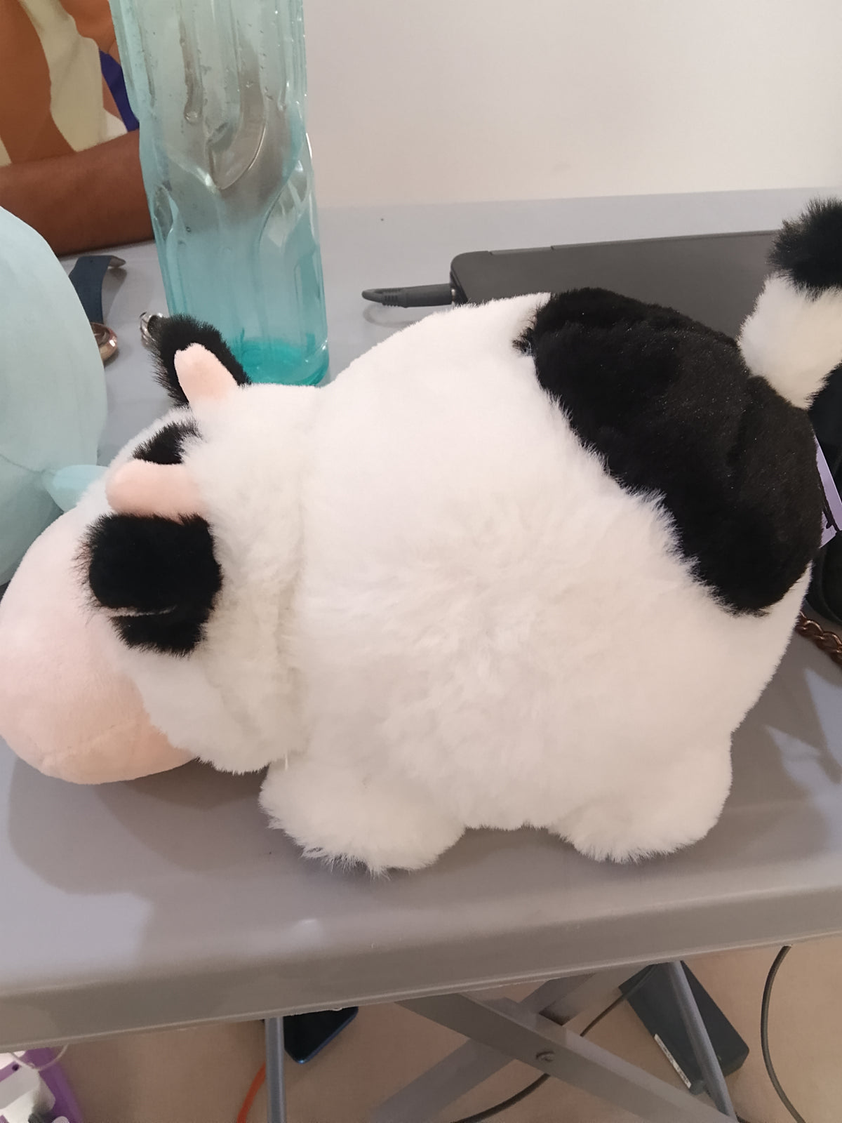 Aurora Spudsters Tutie Cow plush, designed with a rounded, potato-like shape.