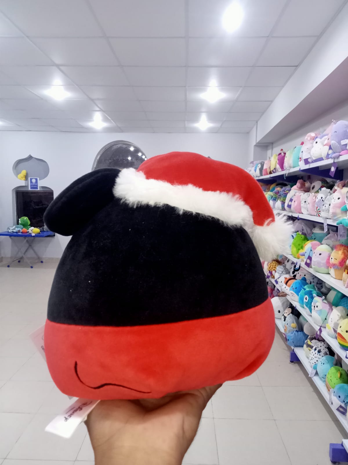 Santa Mickey Mouse Squishmallow.