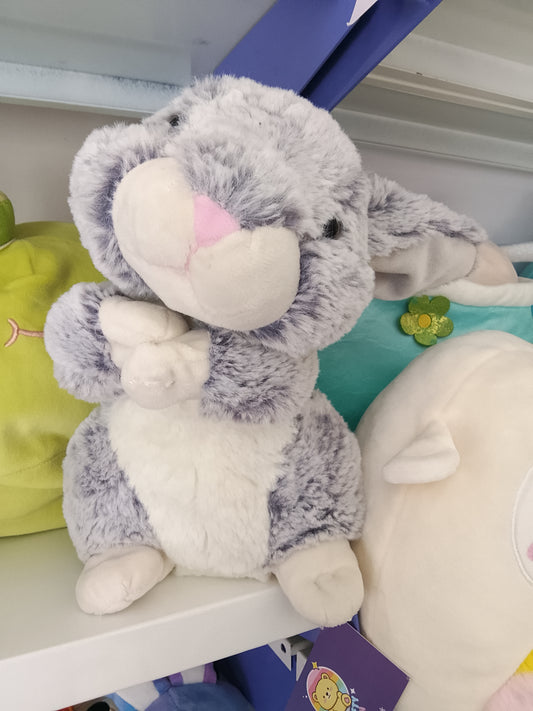 Grey bunny rabbit plush toy.
