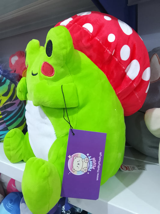 Franklin the Green Mushroom Frog plush toy.