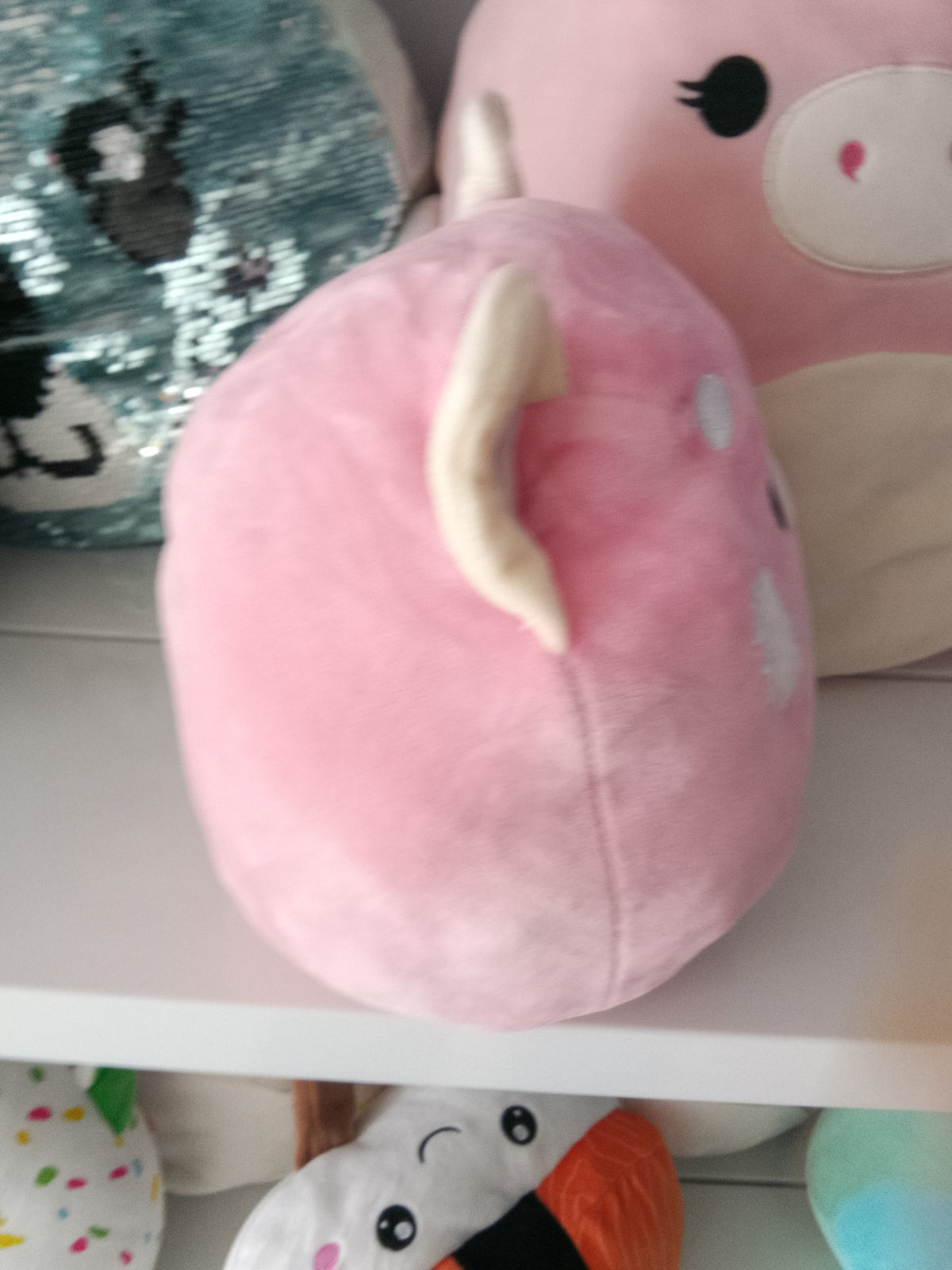 Squishmallows Flip-a-Mallow plush Dohna the Pink Panda and Mischa the Snow Leopard.
