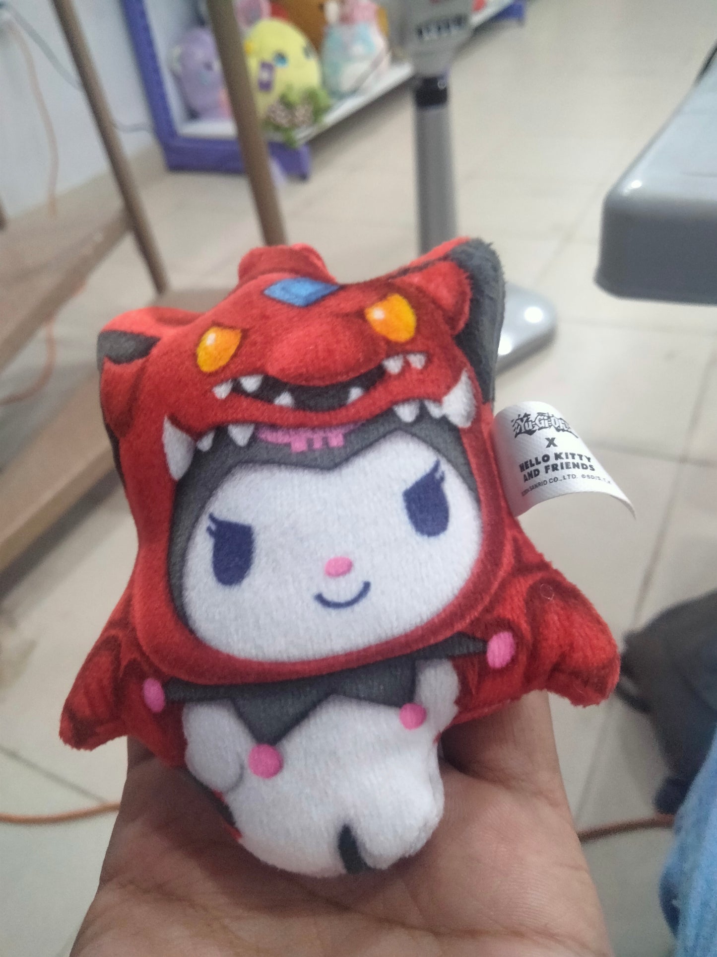 This is a McDonald's Happy & Dangerous Meal Hello Kitty x Yu-Gi-Oh! plush toy.