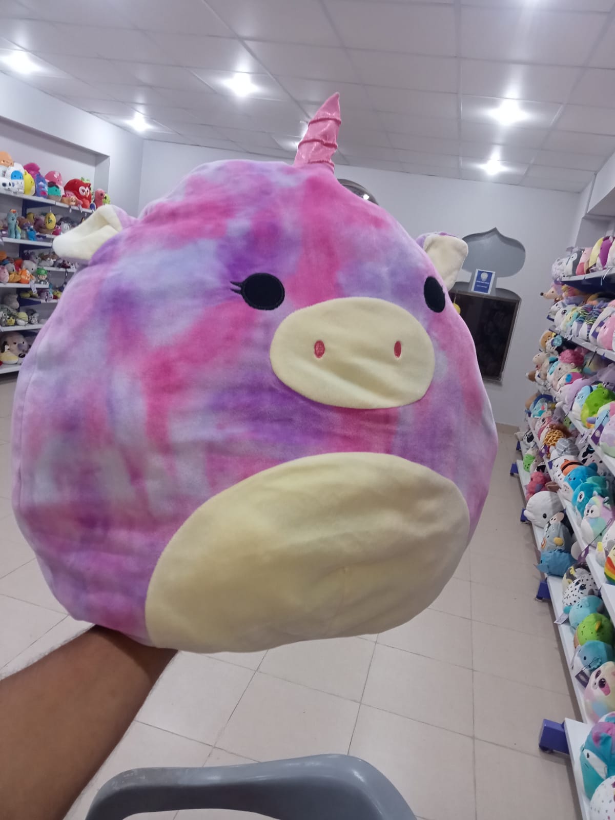 Lola the Unicorn from the Squishmallows brand.