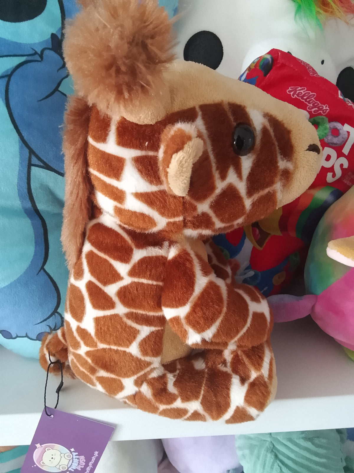 Stuffed giraffe plush toy