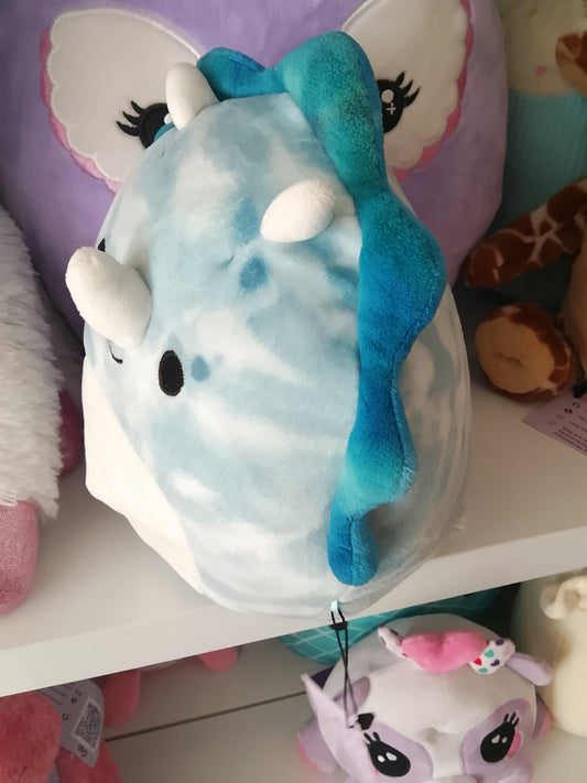 Squishmallows Jerome The Blue Triceratops plush toy.