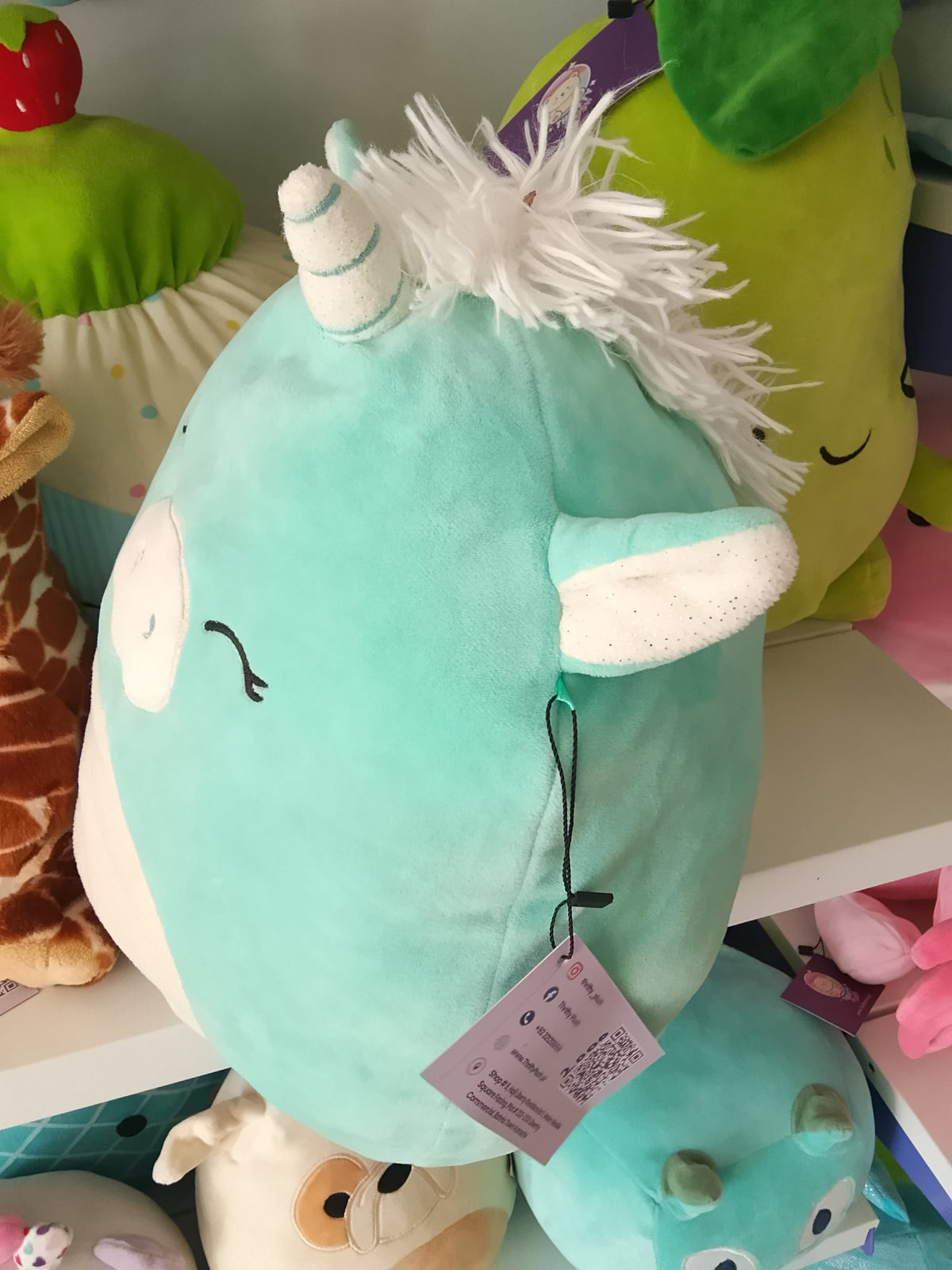 Squishmallows Kennedy the Unicorn Squish-Doos plush toy.