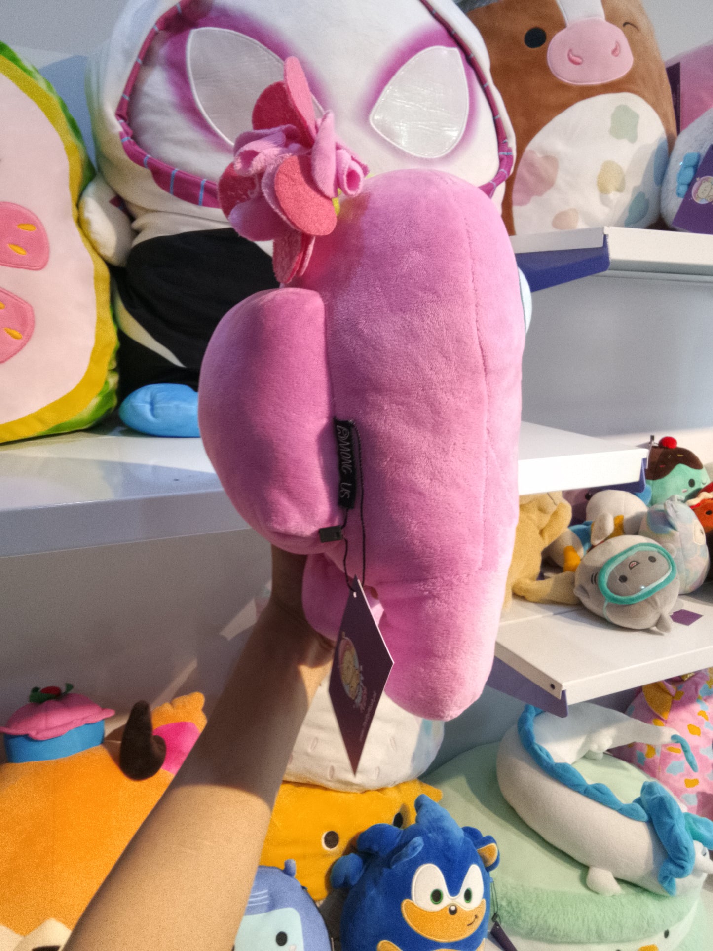 Pink Among Us plush toy.