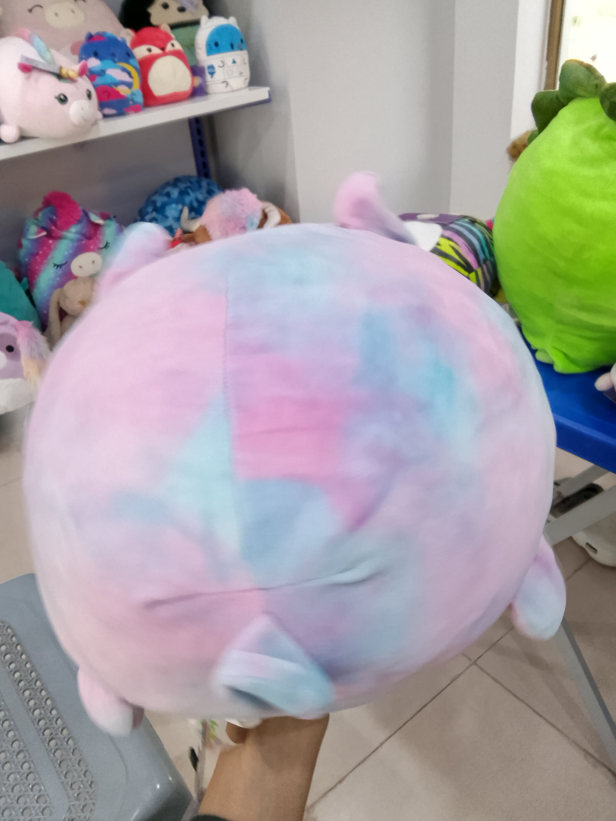 Squishmallows Lana the Rainbow Lamb Sleepamallow plush toy.