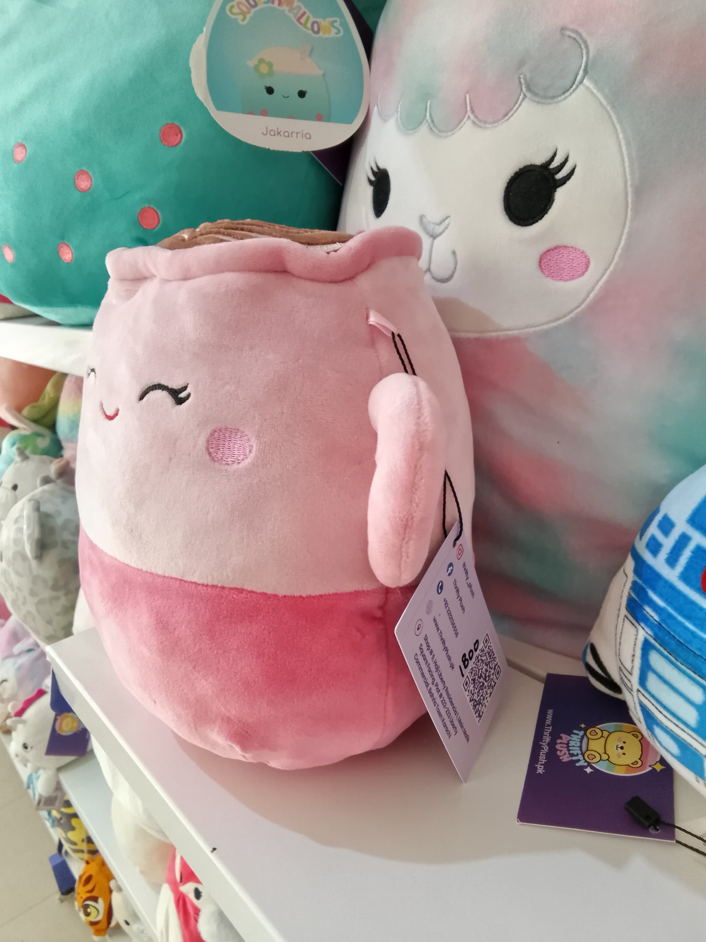 Squishmallow plush toy named Emery the Latte.