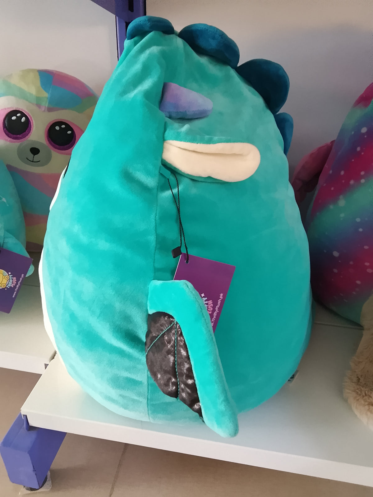 Squishmallow plush toy, likely Tatiana the Dragon or a similar character.