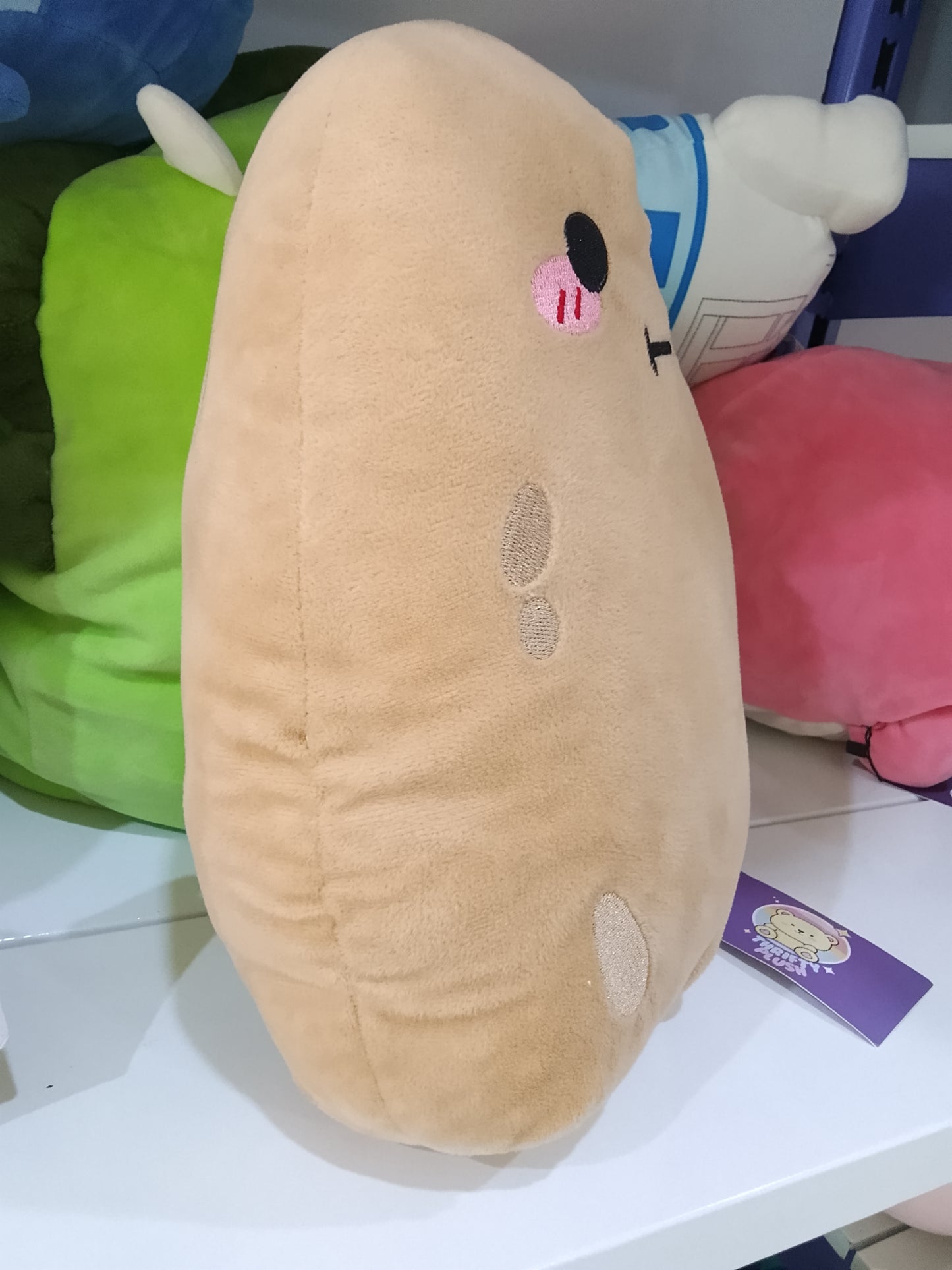 Kawaii-style potato plush toy.