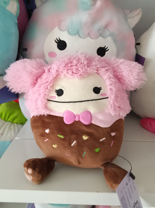 Squishmallows Brina the Chocolate Dipped Pink Bigfoot plush toy.