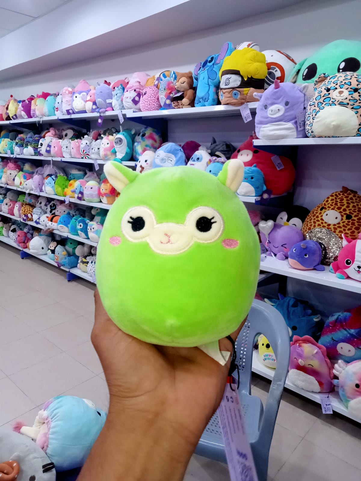 Jim the Alpaca, a character from the Squishmallows brand by Kellytoy.