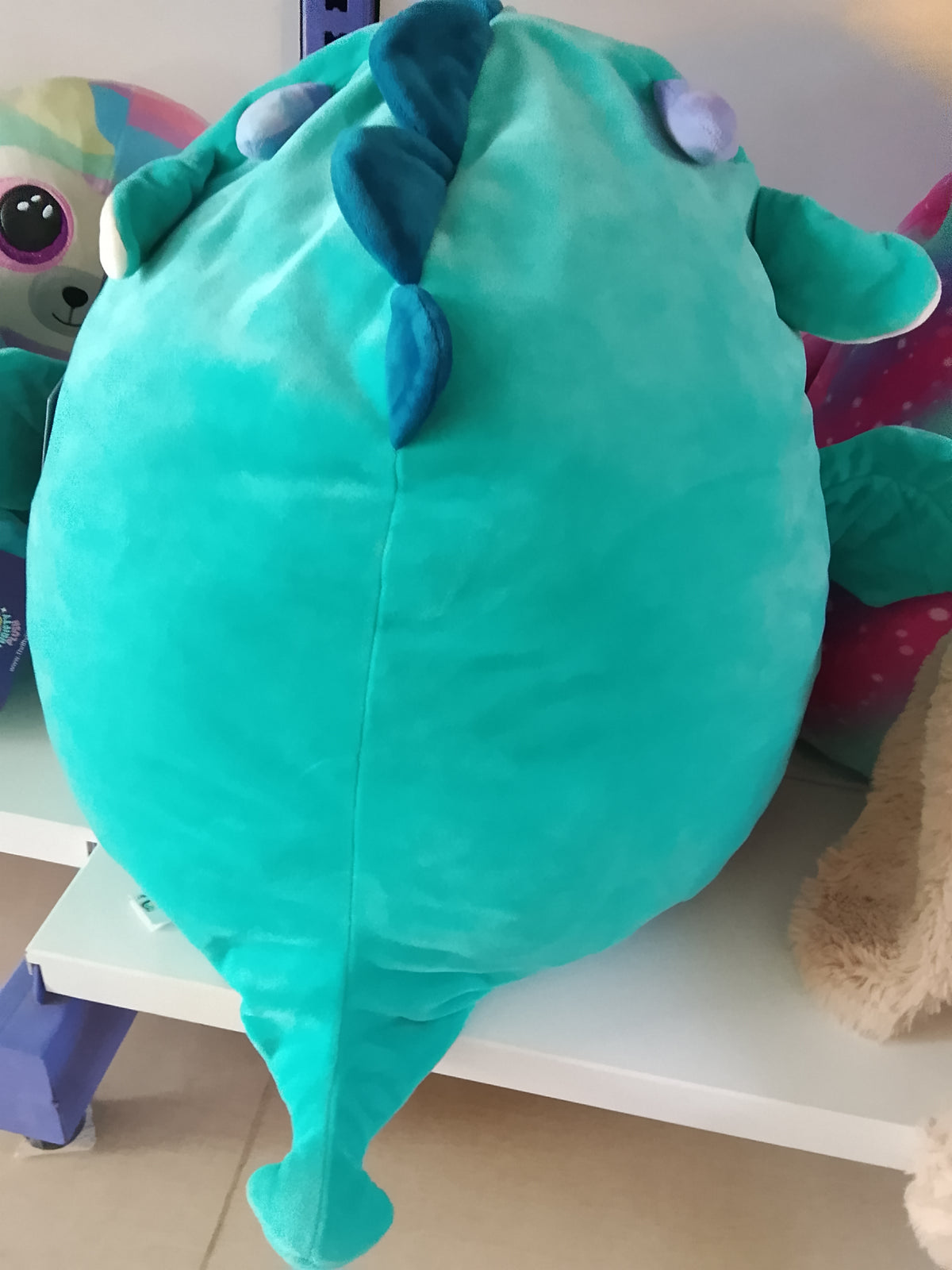 Squishmallow plush toy, likely Tatiana the Dragon or a similar character.