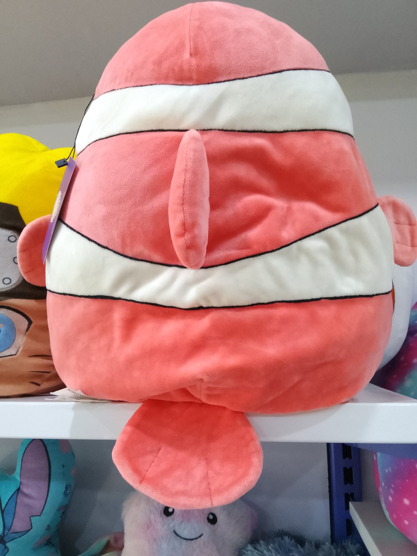 Squishmallows Ricky the Clownfish Plush toy.