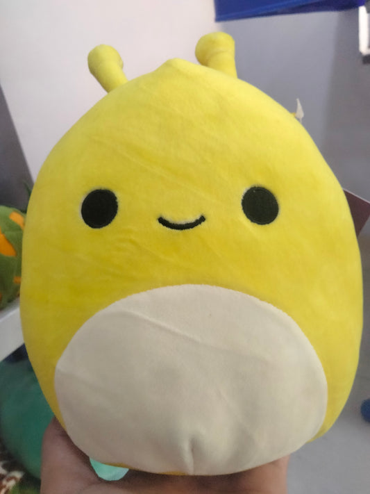 Squishmallows Zarina the yellow banana slug plush toy.