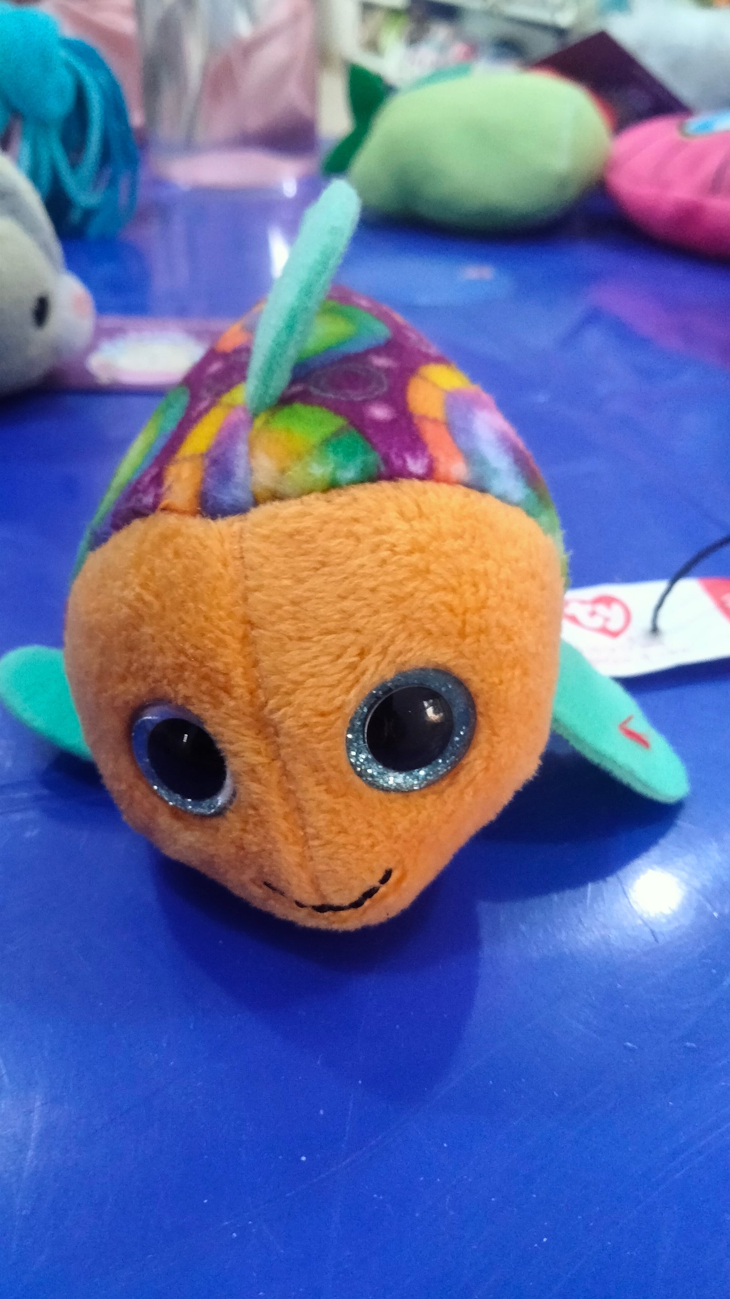 Tys plush fish named Sami, featuring.